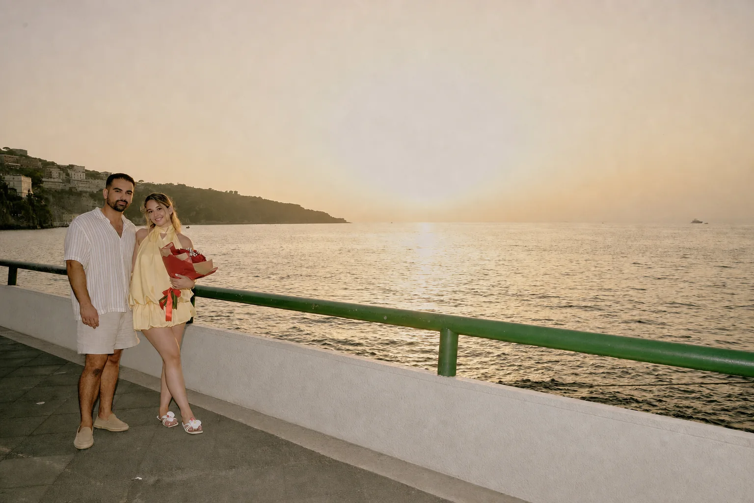 Costantinos and Nicole together at sunset after their Sorrento marriage proposal